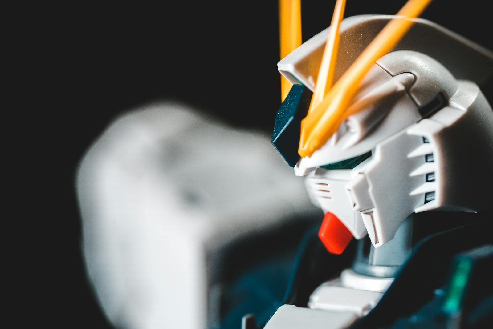 Detailed close-up of a futuristic robot action figure with vibrant colors and intricate design.